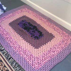 Purple knitted floor mat